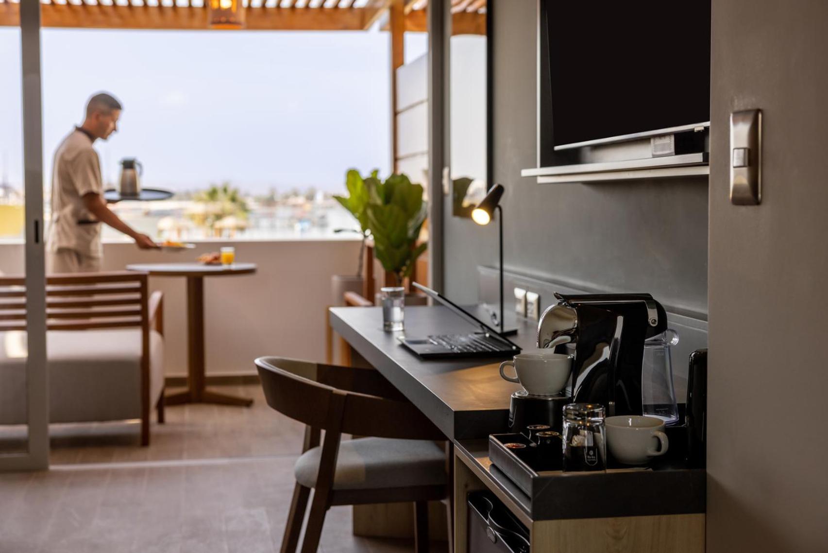 Aranwa Paracas Resort&Spa Exterior foto A Nespresso machine in a hotel room